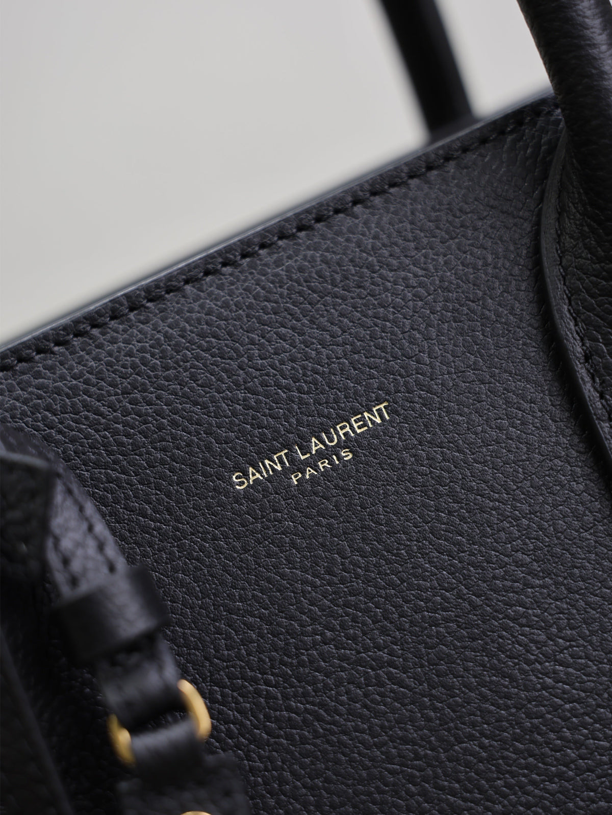 YSL 25S SAC DE JOUR GM 32 IN BLACK SUPPLE GRAINED CALFSKIN GOLD HARDWRE