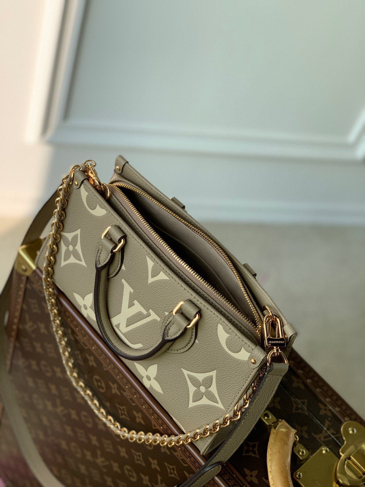LOUIS VUITTON ONTHEGO EAST WEST BAG 25 IN GREEN MONOGRAM EMBOSSED COWHIDE